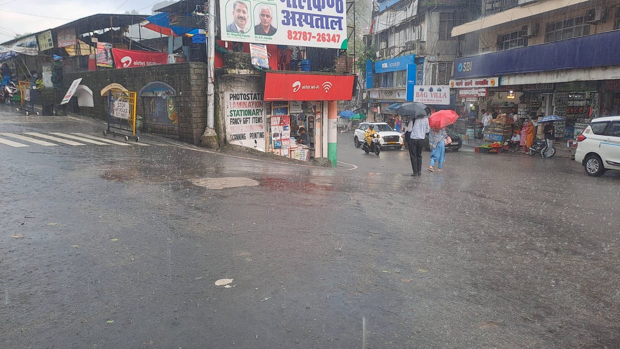 15 minutes of heavy downpour; roads flooded.
