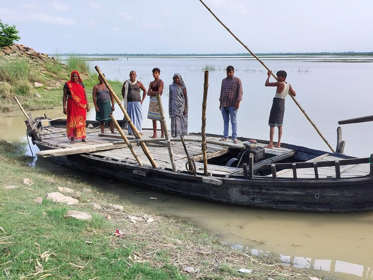 Water has accumulated in several places in the *diara* (riverine) area; villagers are reaching their fields by boat.