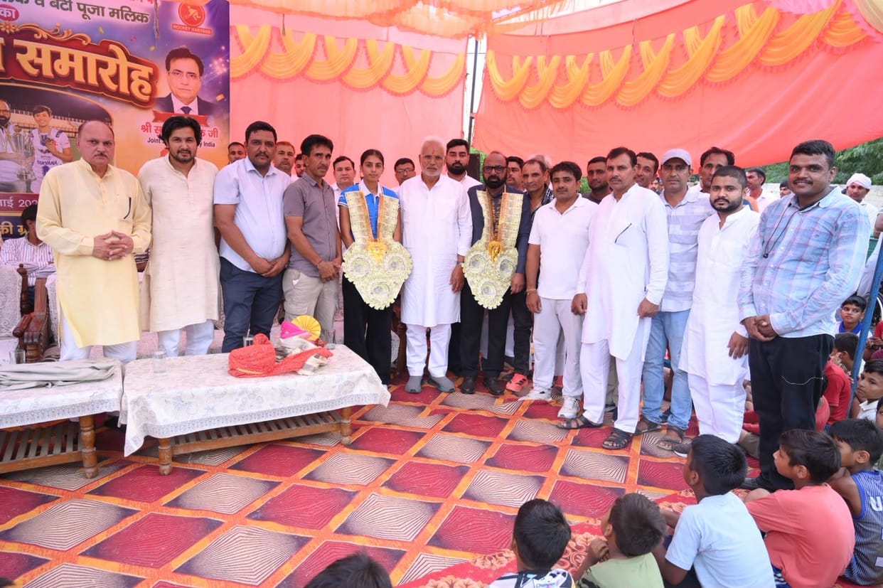 Hockey player Pooja Malik felicitated upon her return from Scotland; MP donates 11 lakh for a bus service for female students.