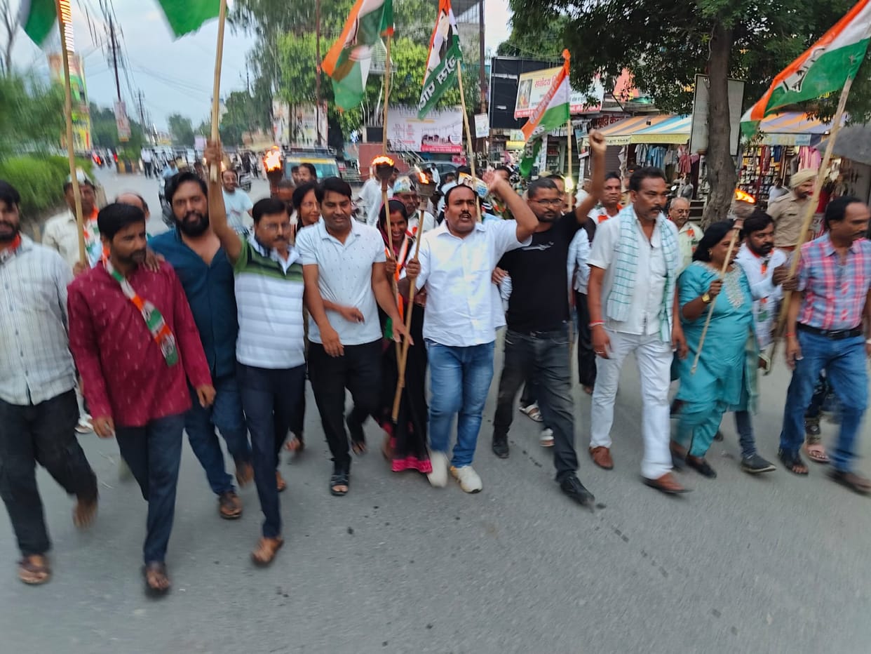 Congress takes out victory march and distributes sweets over Dharmendra Pradhan's resignation.