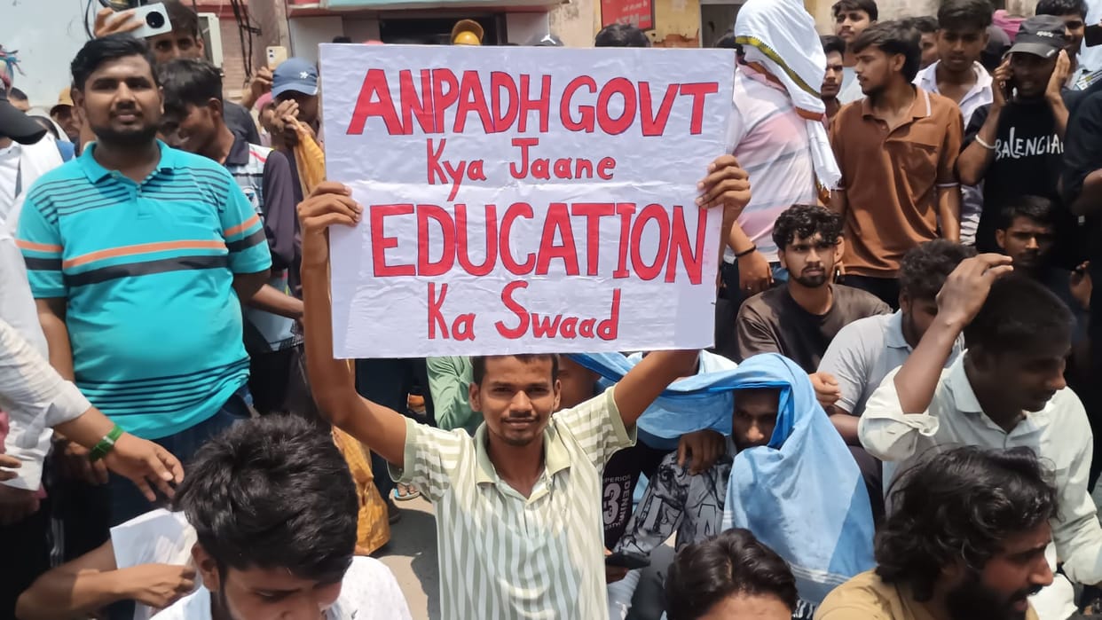 Students protest at the Collectorate against the paper leak; submit a memorandum.