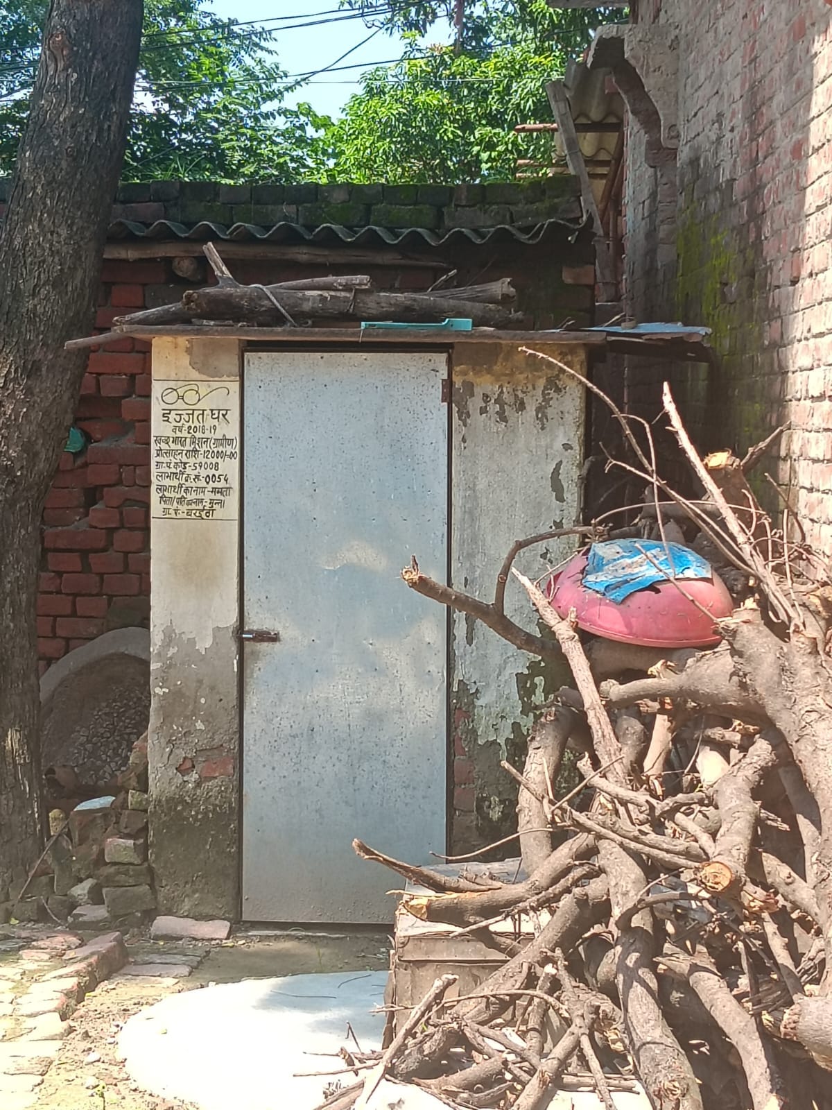 Village ODF in paper, keeping wood and cow dung cakes in toilet