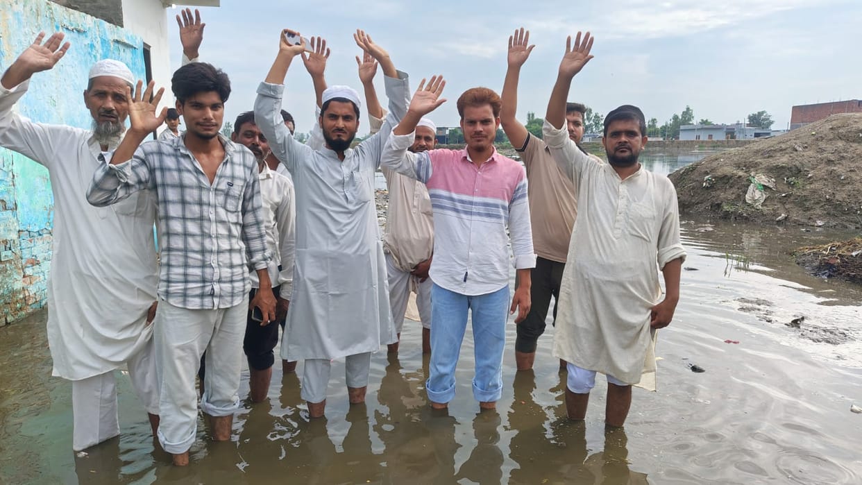Pond water overflows; villagers create an uproar.