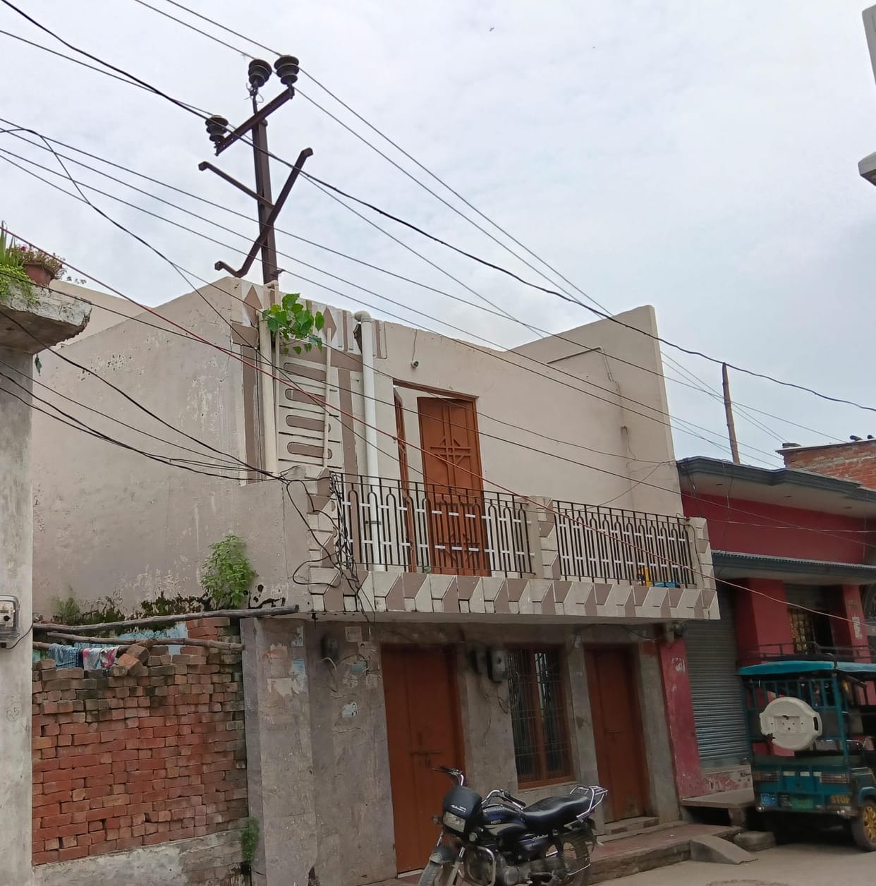 High-tension lines running over houses are becoming dangerous.