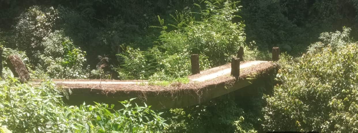 Cracks appear on the culvert in Oder village; it has caved in at the center.