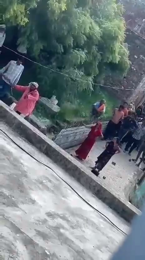 Video of stone-pelting and weapon-waving in a dispute over a road goes viral