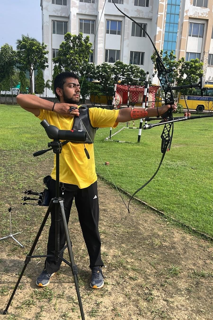 Kartik secured the first position in the district-level archery competition.