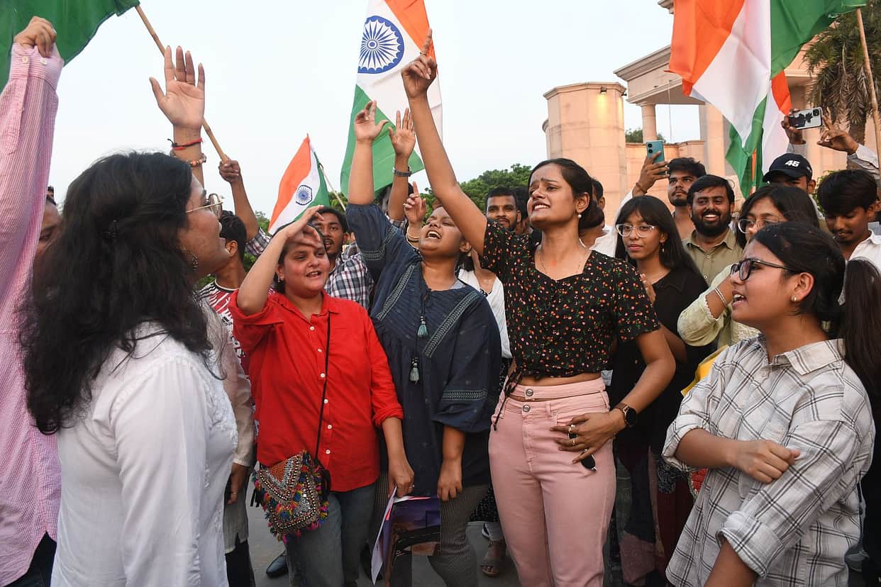 Students celebrated a victory after the Education Minister's resignation.