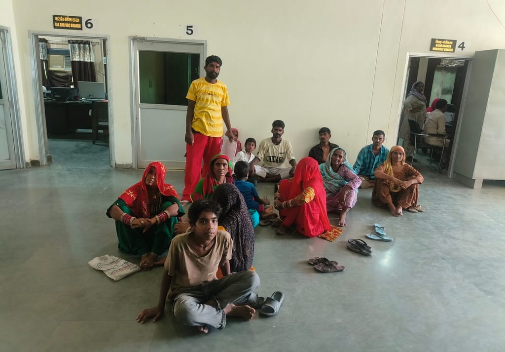 Residents of Sati Mandir Basti reach the municipality to demand compensation for demolition and damage