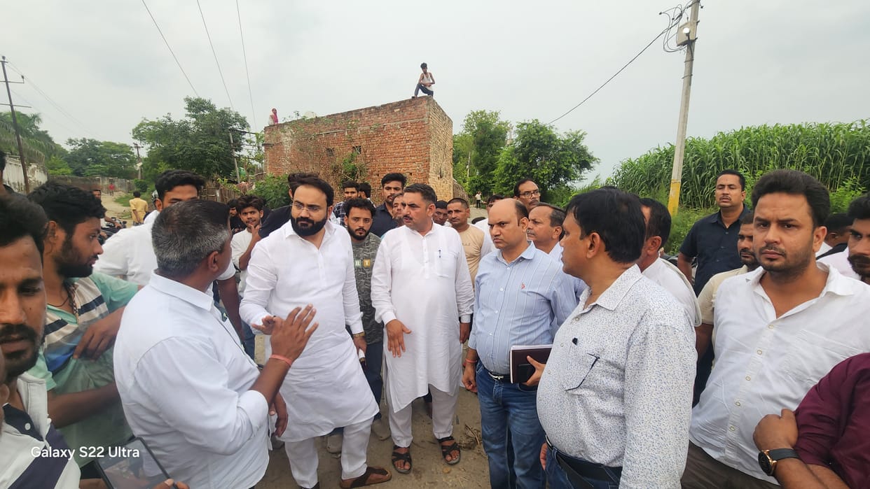 The District Panchayat President listened to grievances while holding a public meeting.