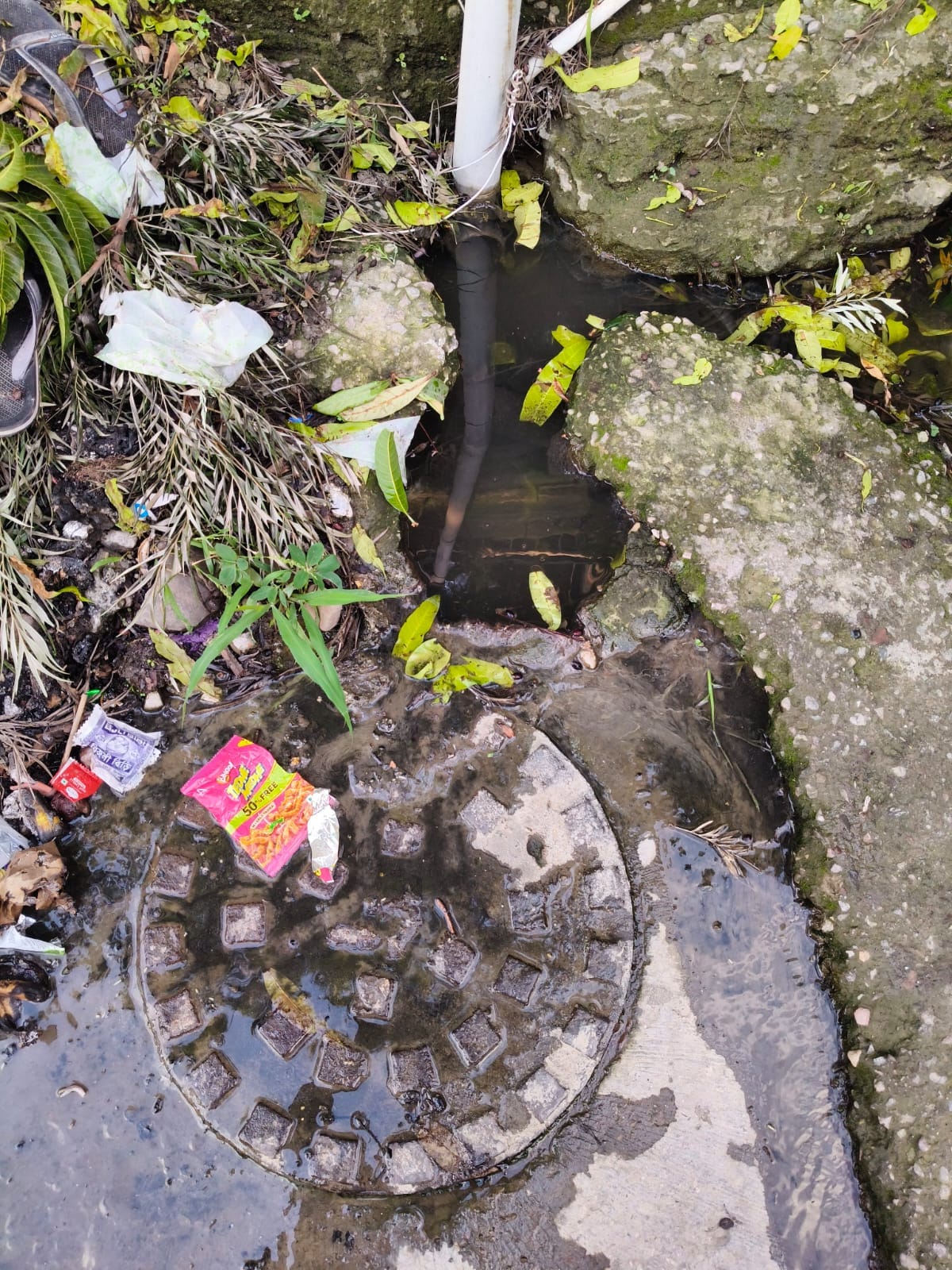 Filth outside Tauni Devi Hospital causes trouble; sewage water flowing onto the road.