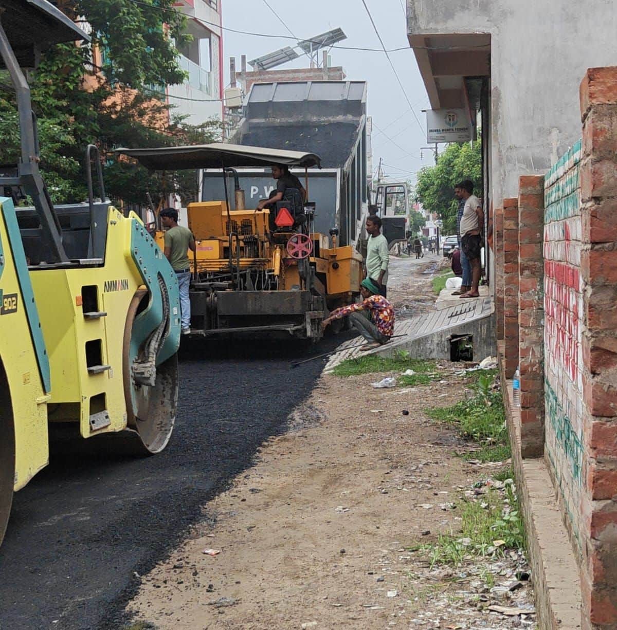 New road being constructed during the rains; colony residents raise objections.