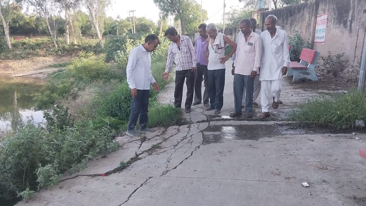 Road around Nangal Chaudhary pond damaged; residents angry.