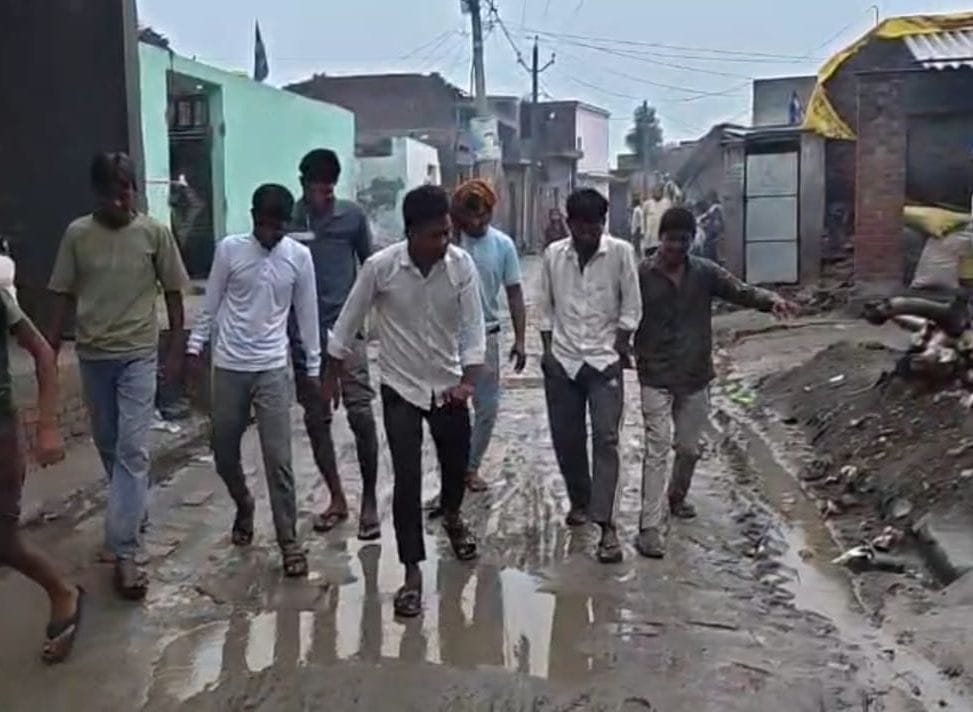Main road turns into a swamp during the rains, causing severe inconvenience.