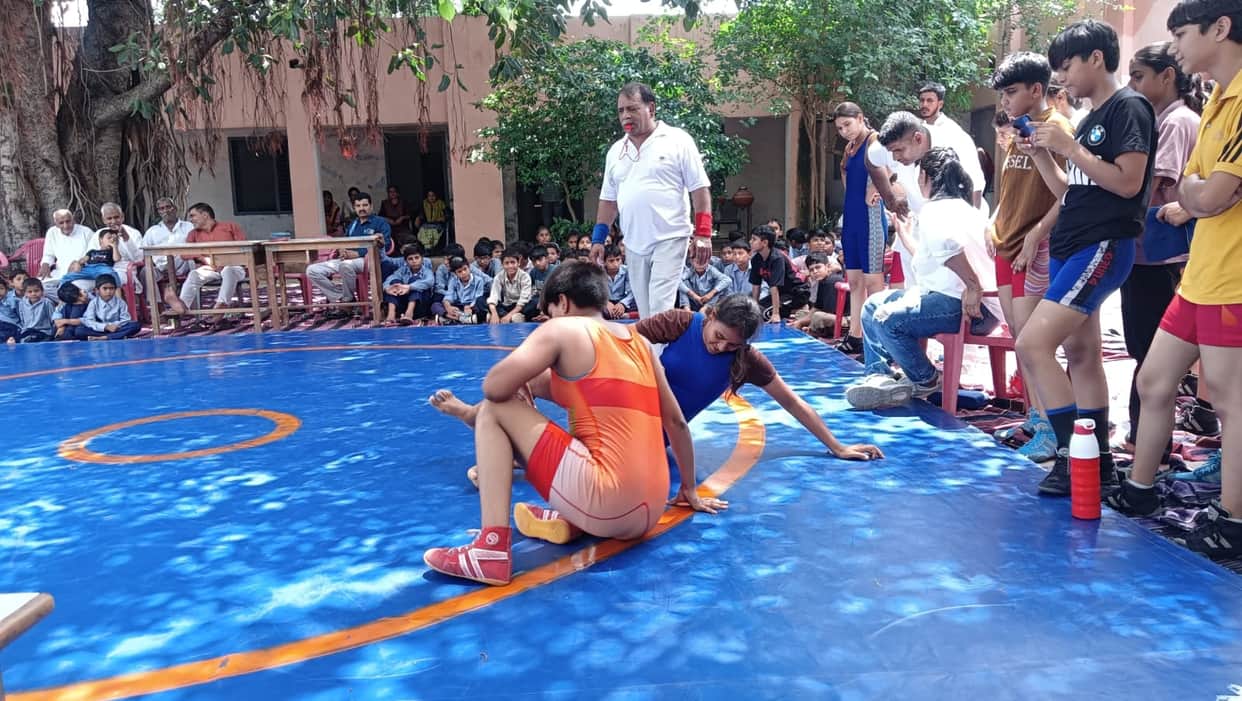 Yashika, Anjali, and Vanshika secured the first position in wrestling.