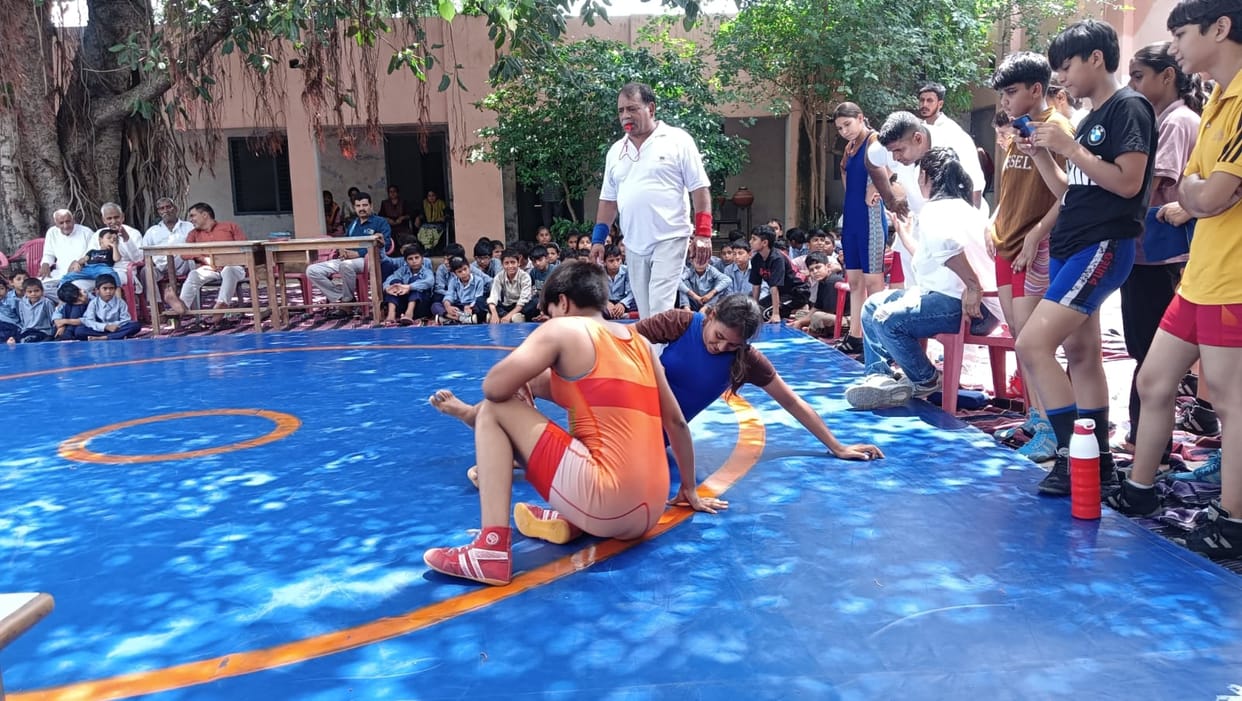 Yashika, Anjali, and Vanshika secured the first position in wrestling.