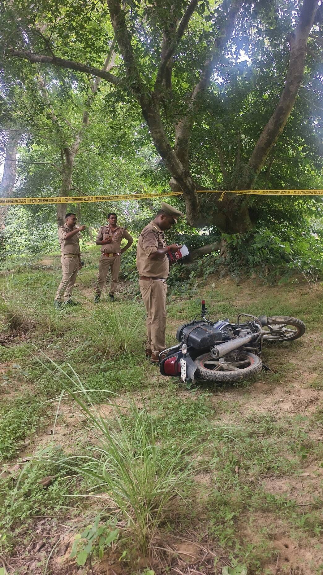 Body of young man visiting in-laws' home found hanging in the garden.