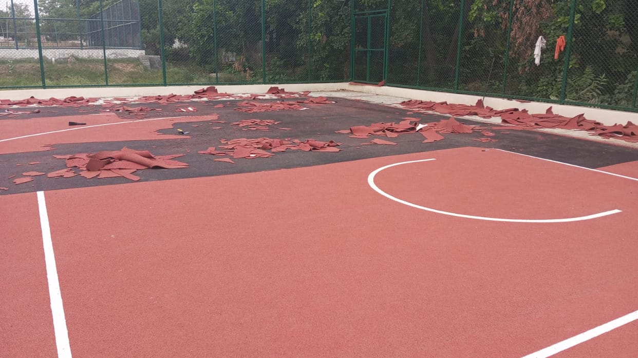 Repair work on the synthetic basketball court has begun.