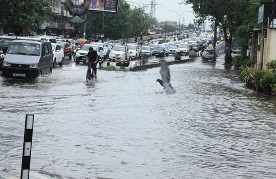 Rain... relief from the heat, but trouble due to waterlogging.