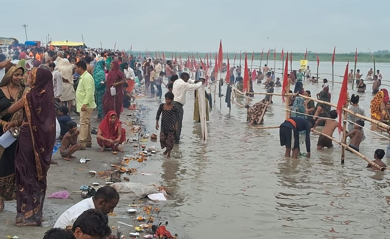 Even the rising water level of the Ganges could not shake their faith.