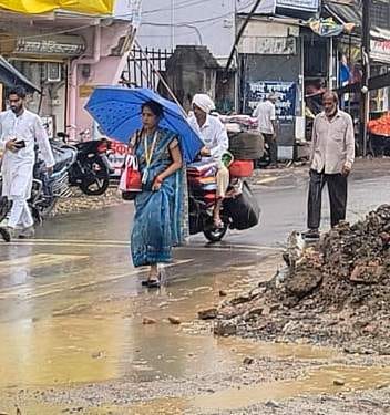 Oppressive humidity causes distress; respite comes with light rain.