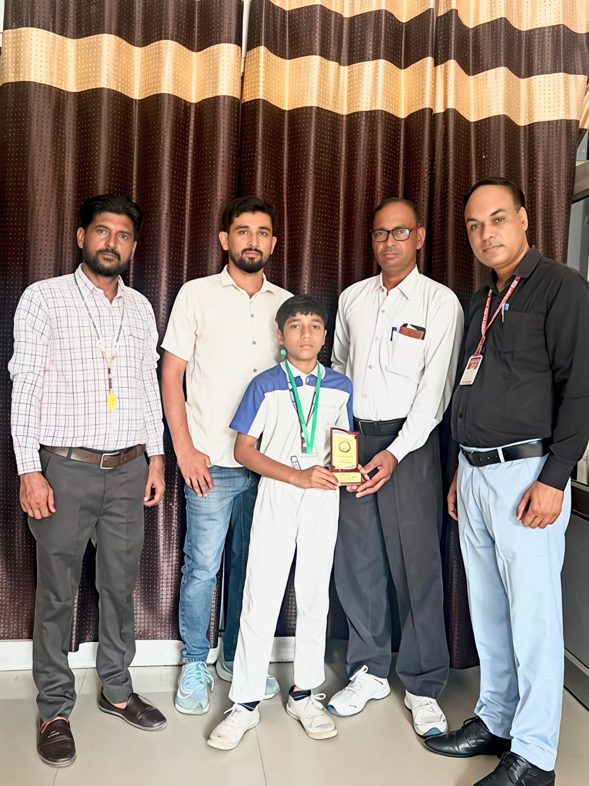 Sajid won the gold medal in the district-level fencing competition.