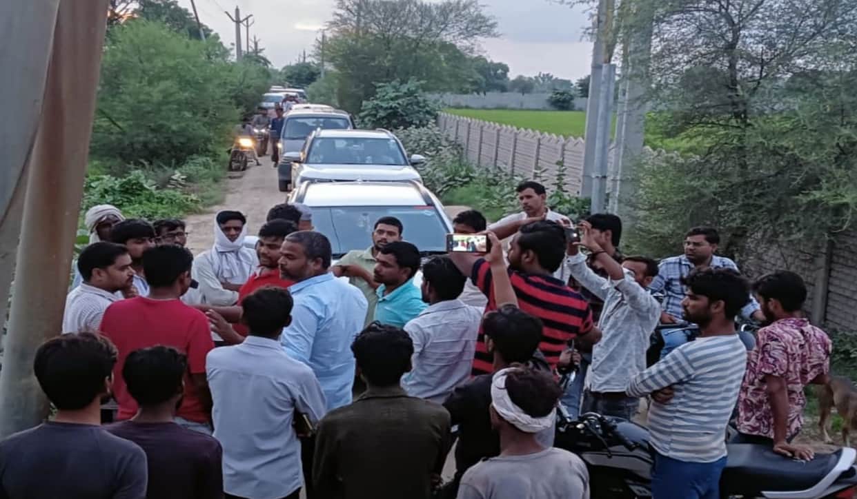 Villagers protest against motorists passing through Baghai village.