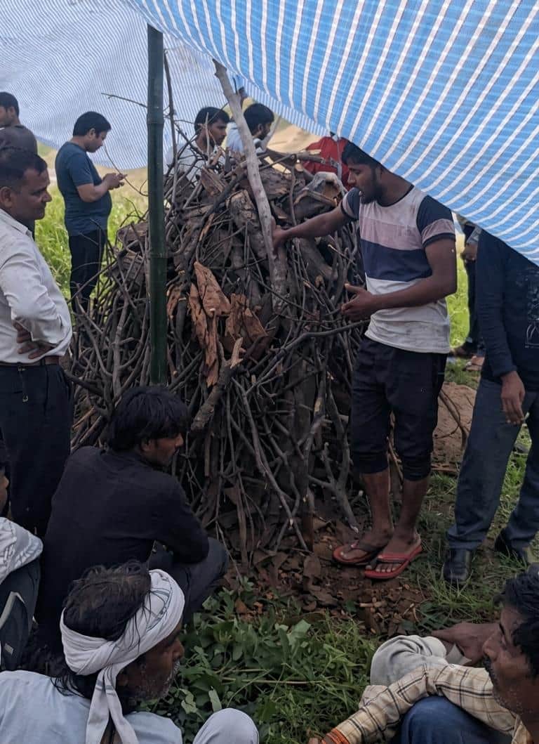 Humanity hangs its head in shame; last rites had to be performed under a makeshift tarpaulin shelter.
