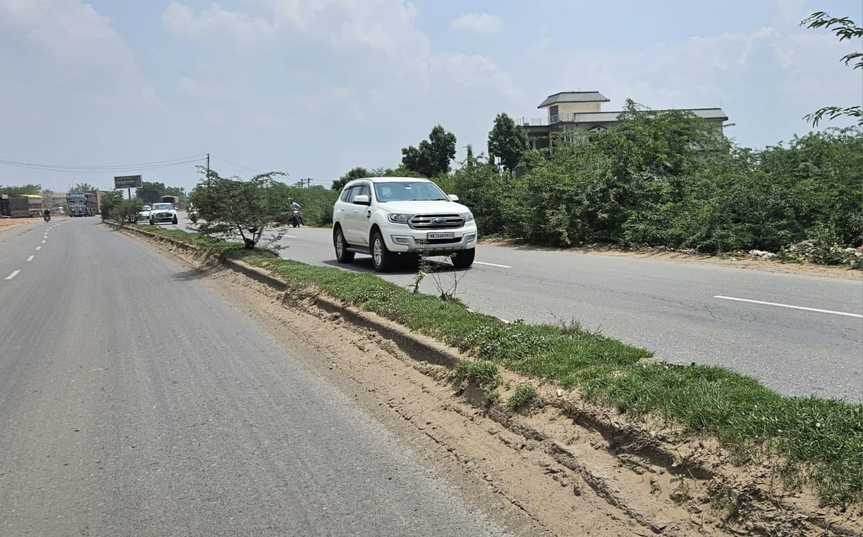 Disregard for standards on National Highway-248A... bare dividers, missing signboards, and a rising risk of accidents.