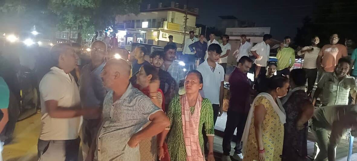 Protest against illegal meat shops in Telibagh; traffic blocked.