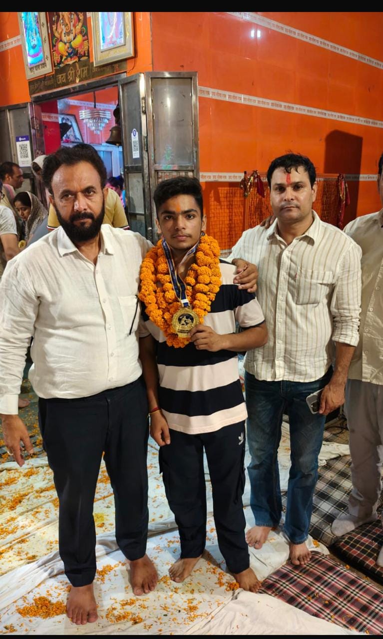 Gold medalist Devansh honored