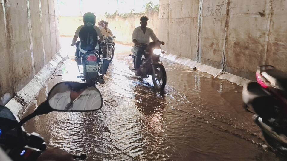 Commuting disrupted due to waterlogging in the underpass; pilgrims face increased difficulties.