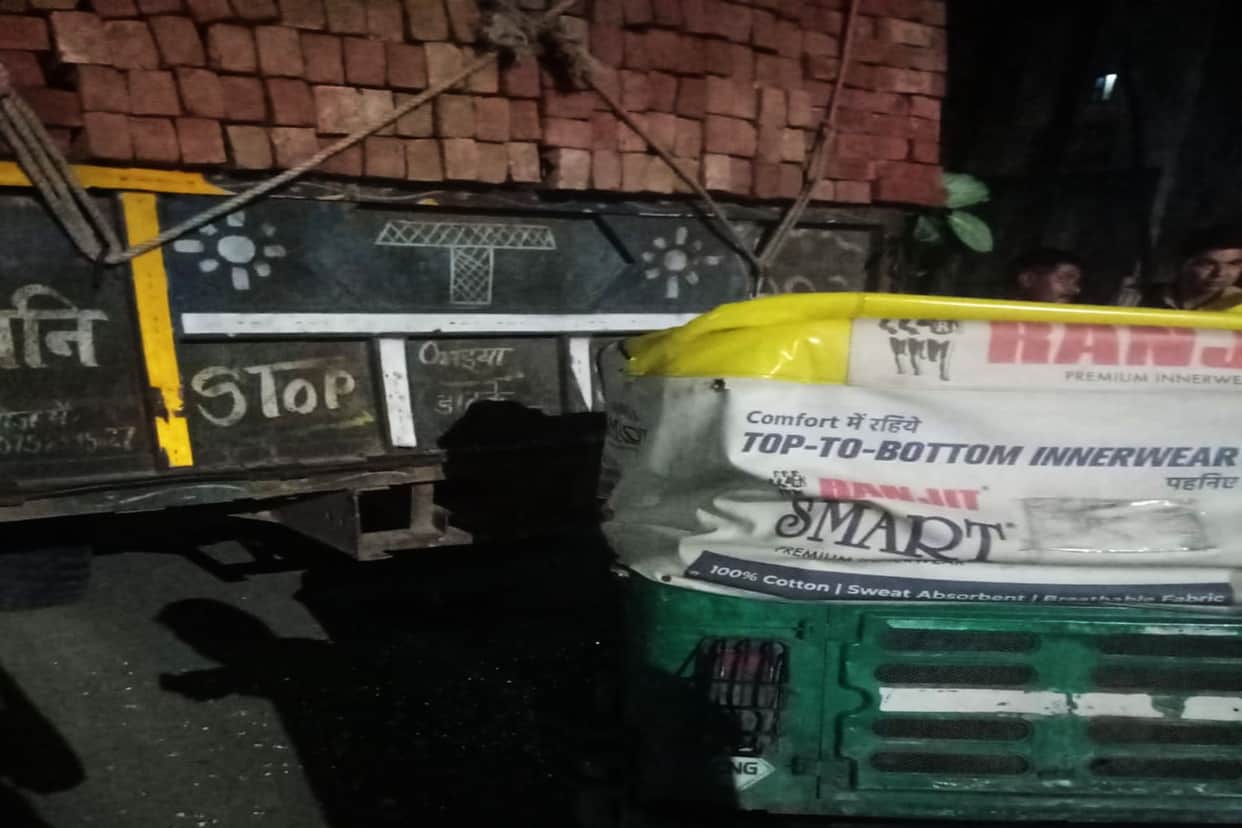 Auto rams into rear of tractor-trolley; two injured.