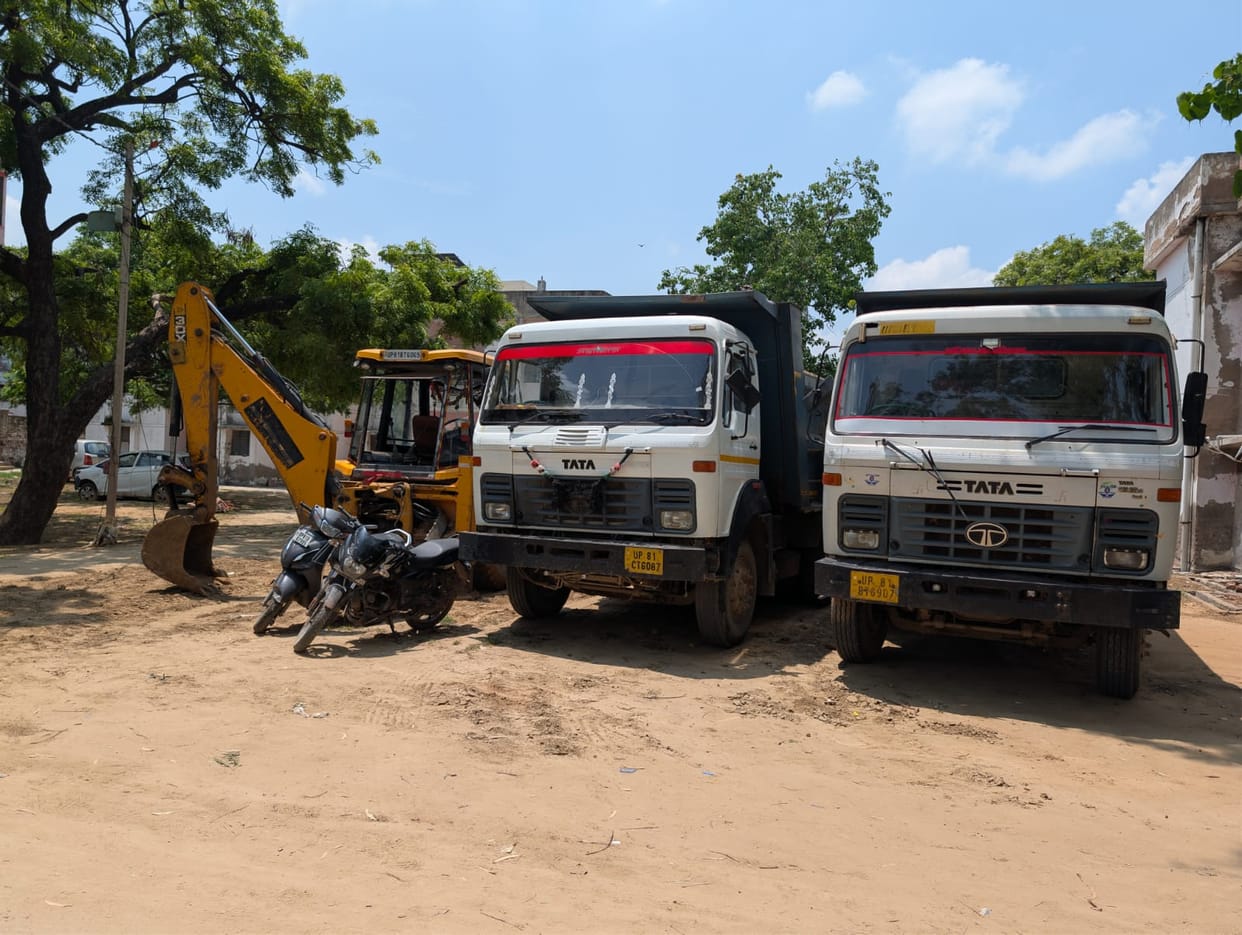 Attempt made to run over police personnel who arrived to stop mining; two constables injured