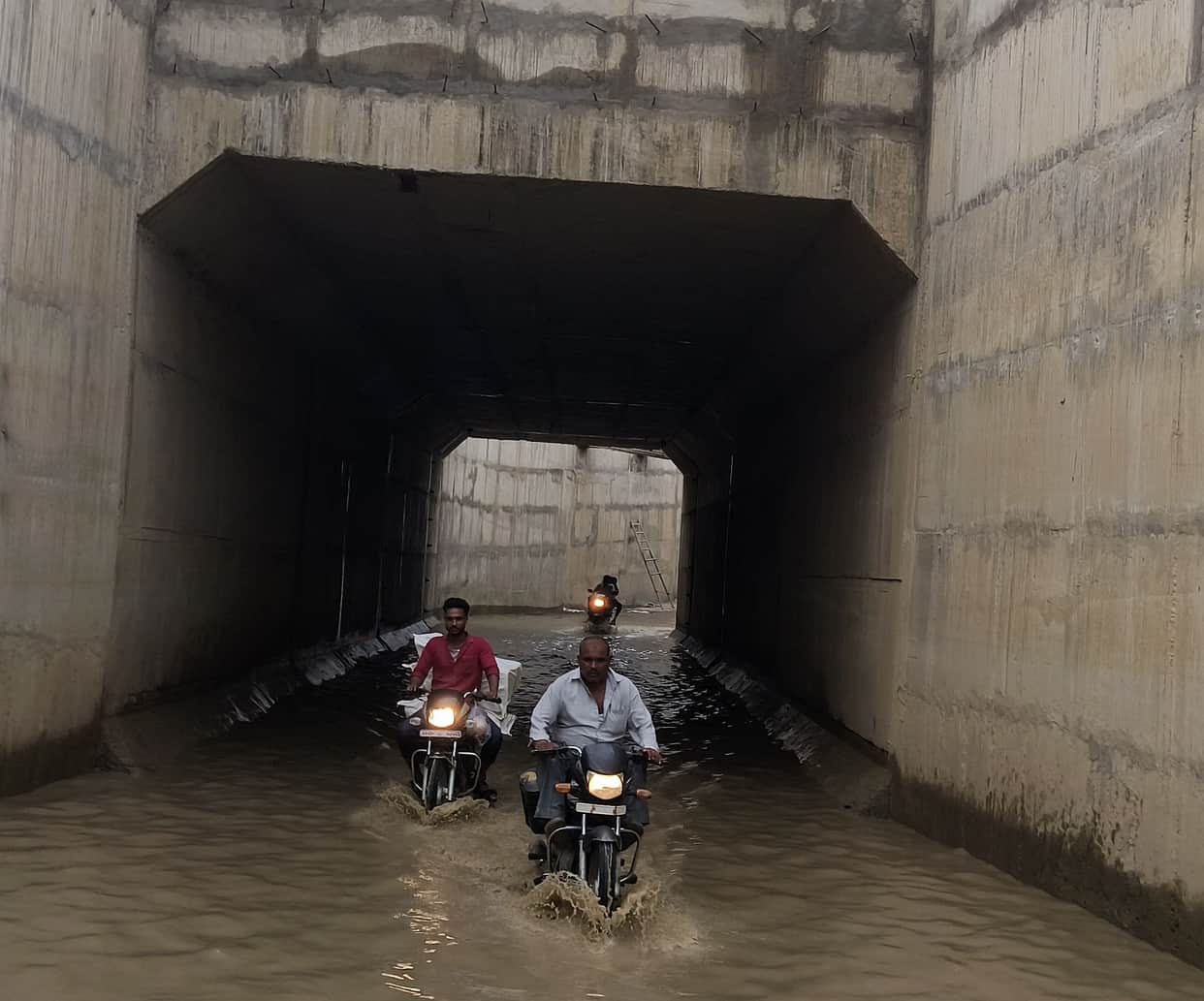 Waterlogging in underpass; traffic disrupted.