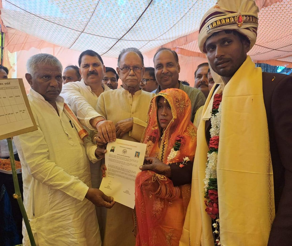 Twenty-seven couples tied the knot by circling the sacred fire.