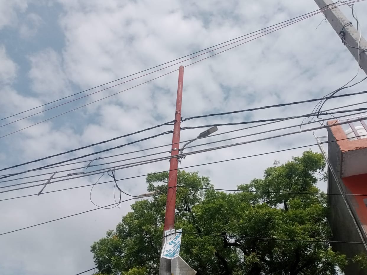The pace of road construction got entangled in electric wires