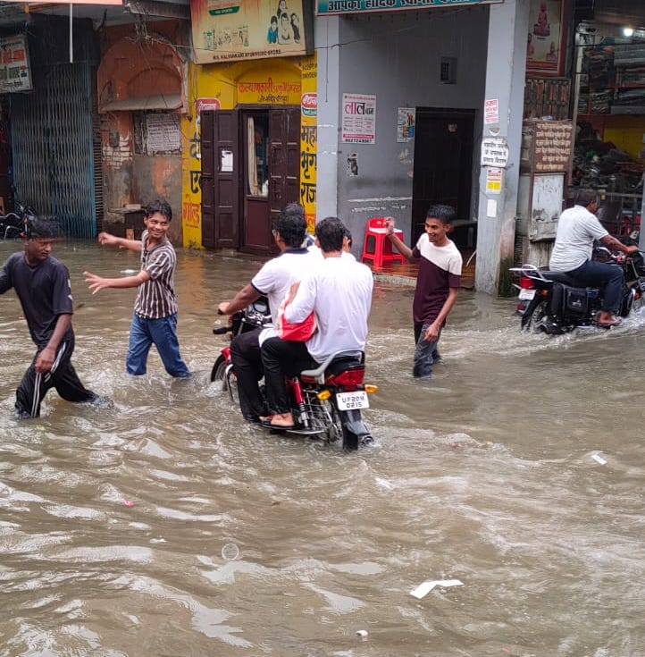 Waterlogging at Jain Mandir Square traps people in their homes and shops.