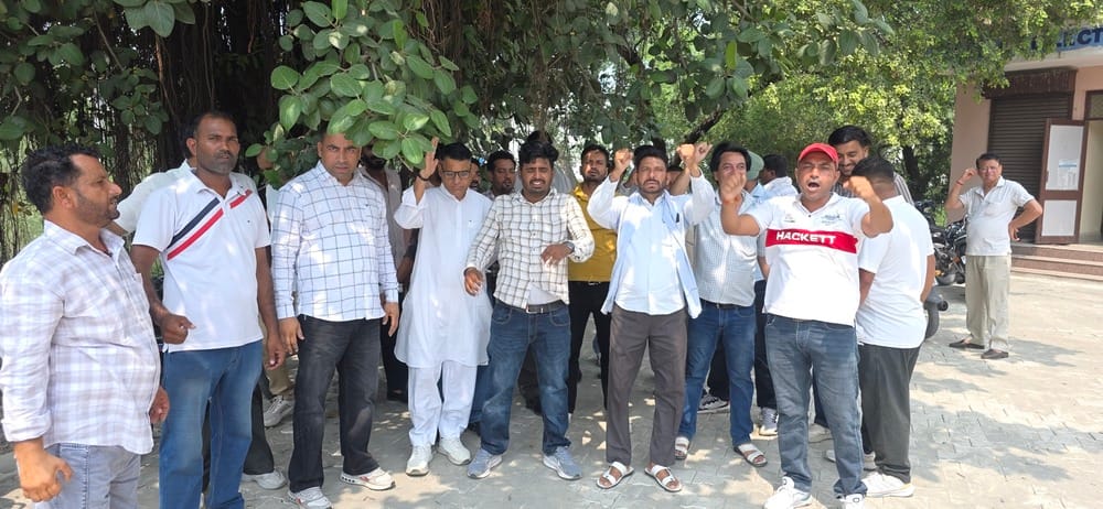Electricity department employees gheraoed the Sub-Divisional Officer's office.