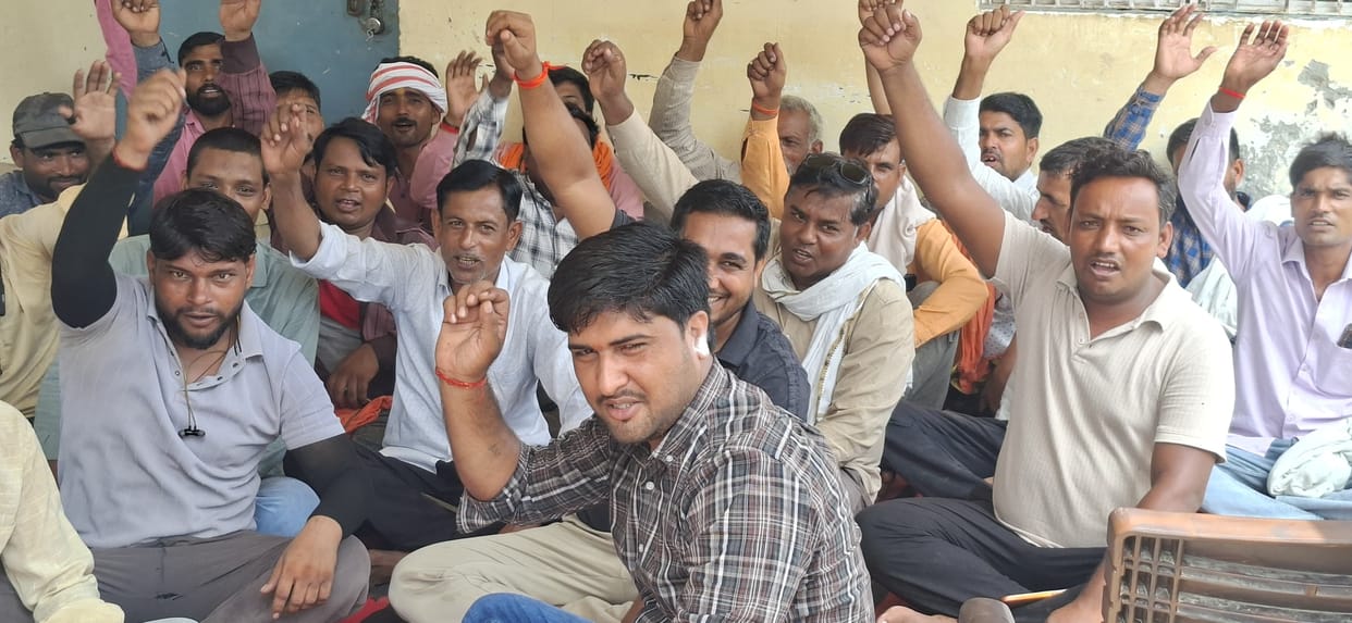 Contract workers raise their voices in support of their demands, stage a protest.