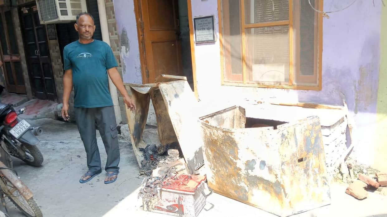 Fire breaks out in laborer's house due to short circuit; belongings gutted.