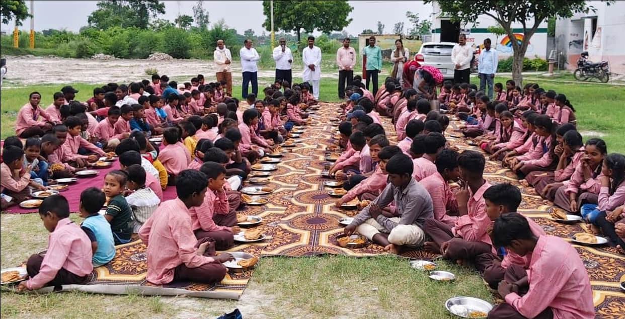 The guests partook of a meal together at the school.
