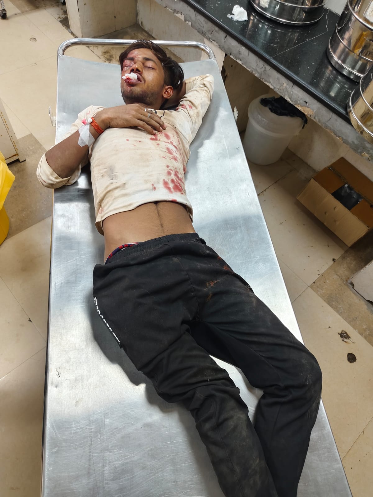 Labourer and contractor fall while working on the roof; both injured.