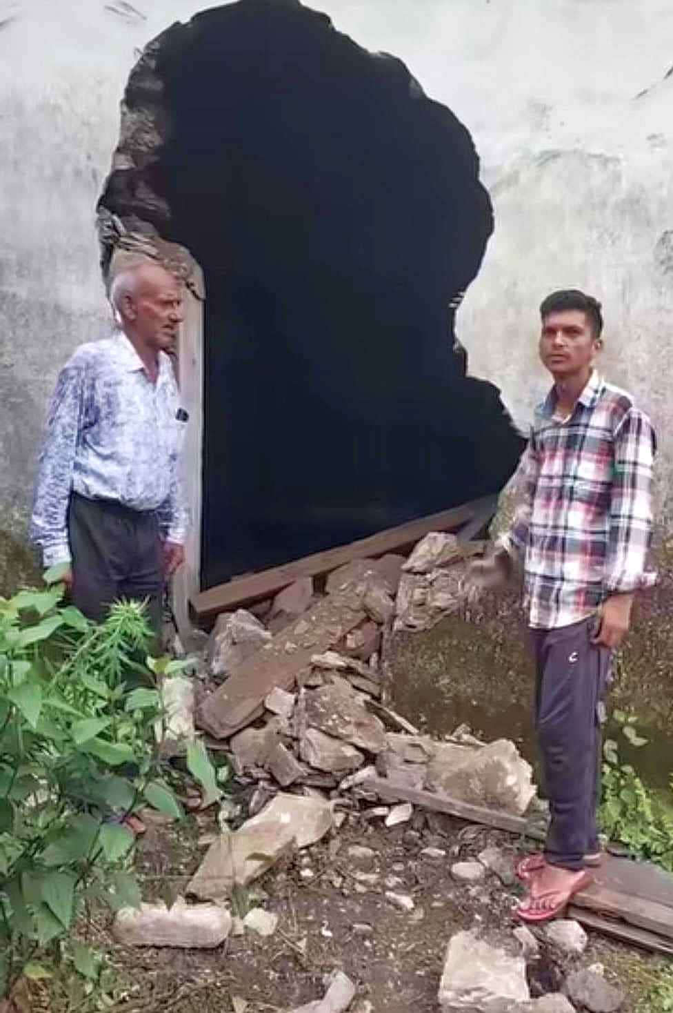 An elephant entered the village at night and destroyed the walls of two houses.