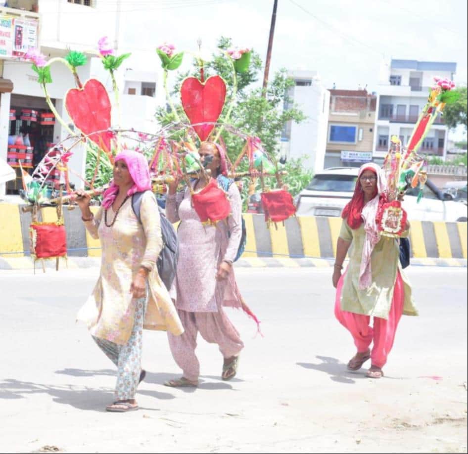 Brought a Kanwar for the family's prosperity and her son's wedding.