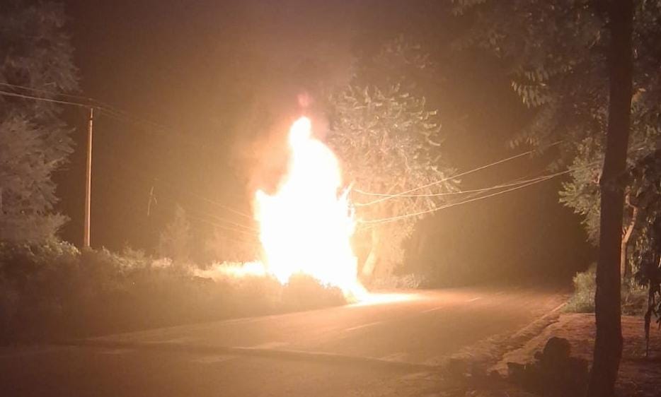 Car crashes into transformer; vehicle and transformer gutted by fire
