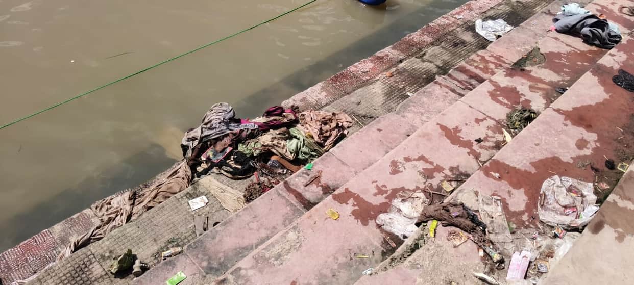 Mandakini's water level recedes; filth on the ghats.