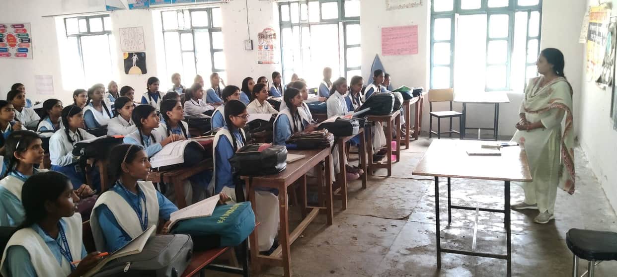 The academic equation is out of balance... a science teacher is teaching English, while a history teacher is solving math problems.
