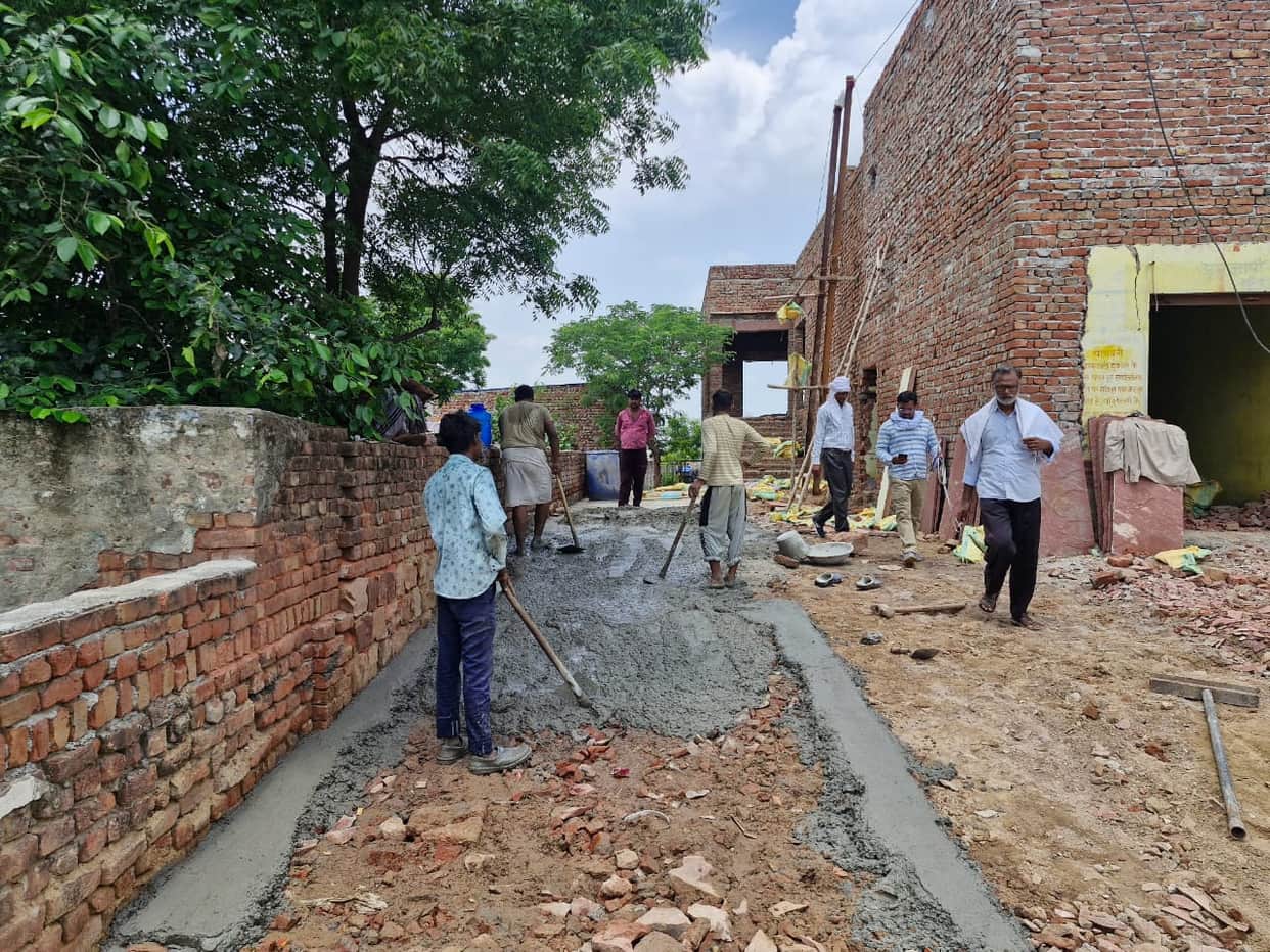 Allegation of encroachment by constructing a CC road on the village access path.