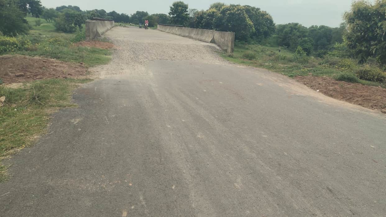 Approach to bridge parallel to 'No Man's Land' collapses; questions raised about quality.
